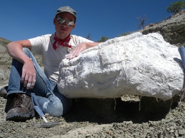 Collin VanBuren collecting a dinosaur nest in Alberta